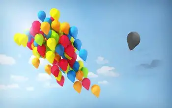 Dibujo de un grupo de globos de colores volando juntos y un solo globo negro volando solo en otro sentido