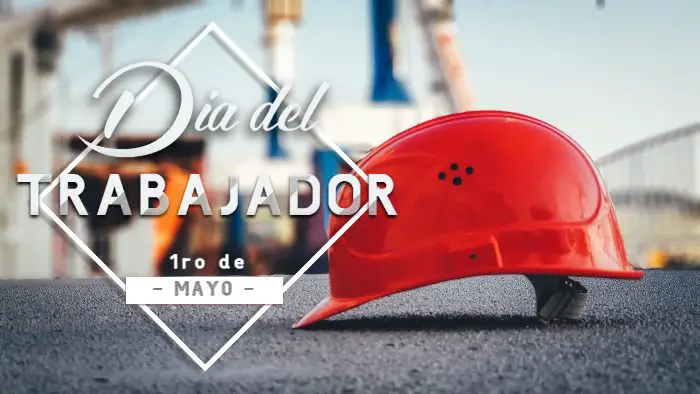 foto de un casco en una zona industrial y dice dia del trabajador 1ro de mayo